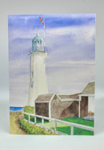 Load image into Gallery viewer, Large white lighthouse located in Scituate, Massachusetts with the buildings as well as the ocean in the front.  There is a white railing and the Beach Rose Bushes going around the buildings and the fence