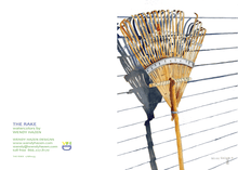 Load image into Gallery viewer, Leaning against the side of a white house is a bamboo rake with afternoon shadows.