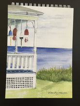 Load image into Gallery viewer, Lobster Buoys on the front porch of a summer cottage looking out to sea notepad with 100 blank pages