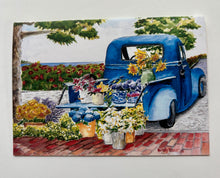 Load image into Gallery viewer, Blue Farmer's truck with flowers looking out to sea