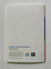 Load image into Gallery viewer, Back of a painting of a basket of hydrangeas with artist information and a QR code.