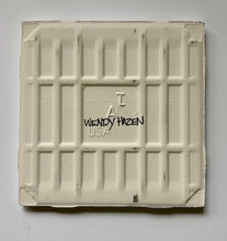 Load image into Gallery viewer, Tile with grid pattern and 'Wendy Hazen USA' branding on a gray background.  Perfect for tile installation.