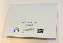 Load image into Gallery viewer, Card with 'ROSES &amp; EUCALYPTUS' text and branding on a light background