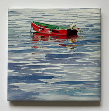 Load image into Gallery viewer, Ceramic tile of a red skiff with the motor propped up and two bumpers attached to the port side with a green interior paint on calm gray blue green water.