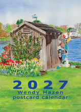 Load image into Gallery viewer, A watercolor-style 2027 postcard calendar cover featuring a rustic wooden shed beside a river cove, with flowers in the foreground and the text '2027 Wendy Hazen postcard calendar' at the bottom.