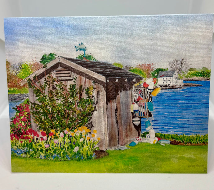 This is a watercolor of a New Castle, NH Garden Shed with red and yellow tulips and the Piscataqua Cafe in the distance across the cove.  it is early spring.  And there is a fish cupola on top of the wee shed
