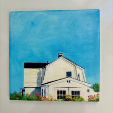 Load image into Gallery viewer, White summer house with gardens in front resting on the cliff with a view to the sea