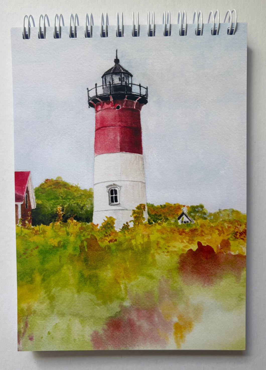 Nauset Lighthouse located in Eastham on Cape Cod in Massachusetts is absolutely glorious in the fall colors.  