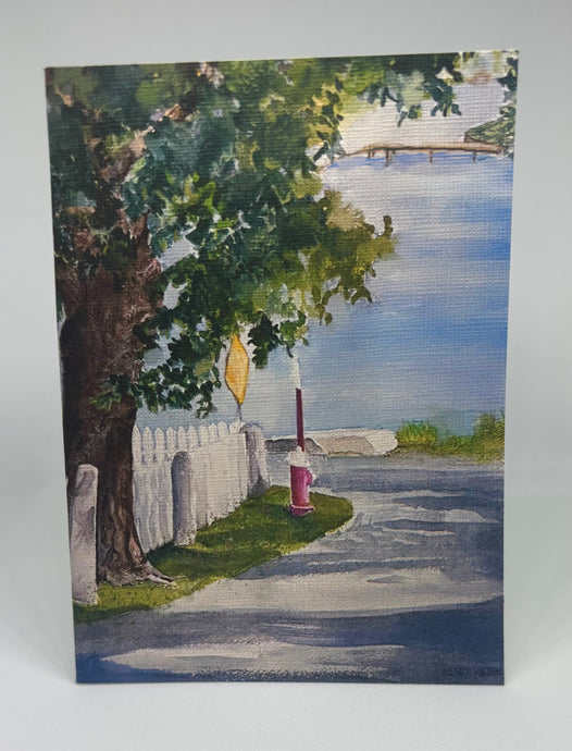 on the Oliver Street looking towards the Piscataqua River with the big oak tree off to the left (that has since been cut down) with the white picket fence leading down to the water's edge.