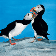 Load image into Gallery viewer, Two puffins on a granite gray rock with a clear blue sky.
