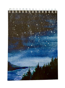 Stars, water and outline of coast line