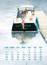 Load image into Gallery viewer, A watercolor-style calendar page showing a small boat tied to a dock in Camden Harbor, with the word JULY and a Sunday-through-Saturday date grid at the bottom.