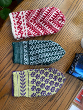 Load image into Gallery viewer, The top mitten was knit with 85% wool, 15% mohair.  The middle mitten was knit with finger weight yarn on #1 needles.  Same for the rose pattern mitten.