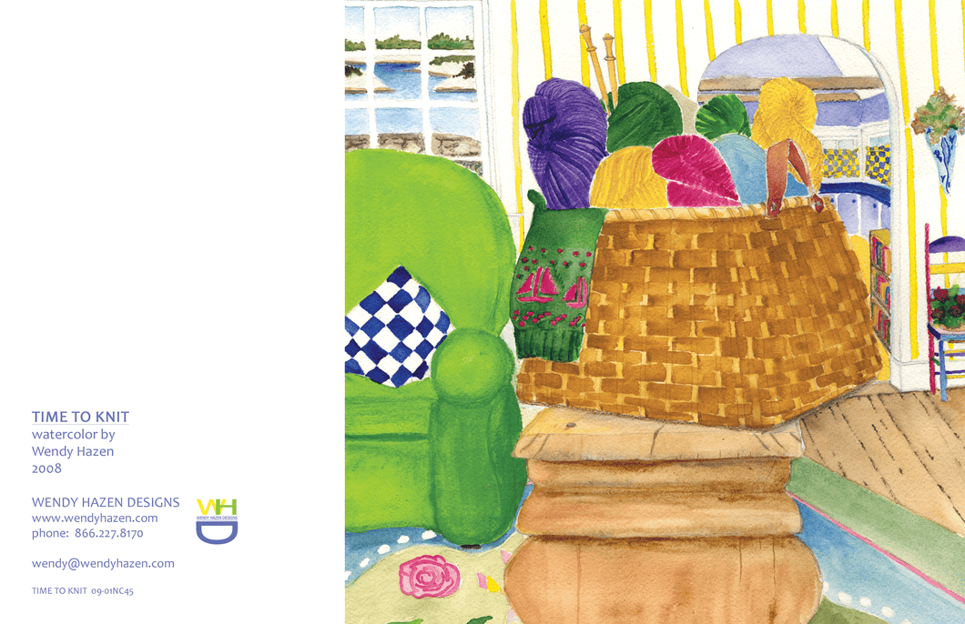 Knitting basket with colorful yarn skeins and wooden needles.  Family room setting with kitchen in background and waterview