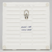 Load image into Gallery viewer, Back of family of Loons Plain Tile with the silver folding hanger and the 4 'bumpons'