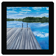 Load image into Gallery viewer, A ceramic tile of an early July morning on Norton's Pond with the  puffy clouds reflected like glass in the water with a black frame