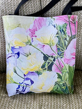 Load image into Gallery viewer, A canvas bag with a colorful painting of  Lisianthus flowers. A 16“ x 16“ x 2 1/2“ canvas bag with black nylon straps.  A perfect gift for the gardener in your life.