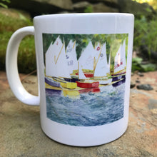 Load image into Gallery viewer, Sailing Class.  It is 8 AM and we are at the water&#39;s edge to rig the boat for our class.  The wind is just beginning to pick up.  Coffee with 8AM memories