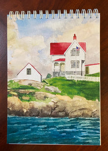 Nubble Lighthouse front of notepad with 100 blank pages